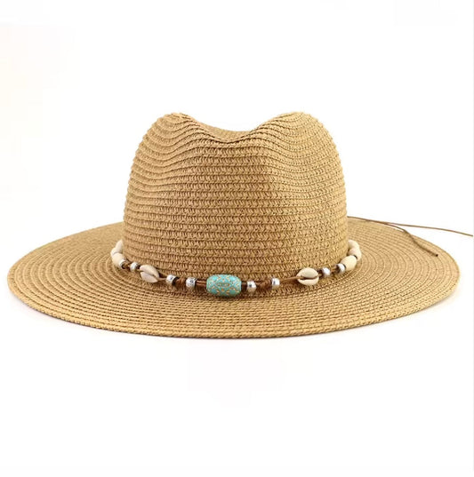 Beige straw hat with a decorative band on a white background